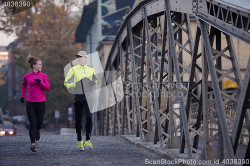 Image of young  couple jogging