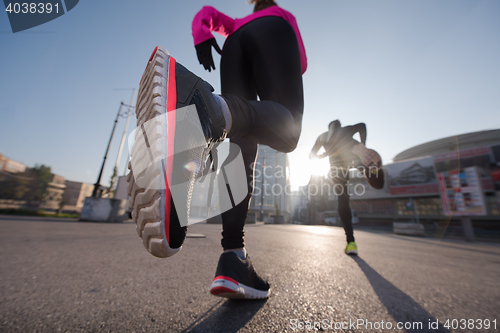 Image of young  couple jogging