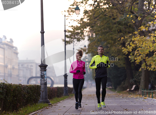 Image of young  couple jogging