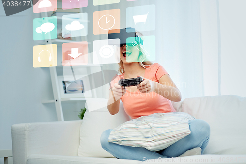 Image of woman in virtual reality headset with controller