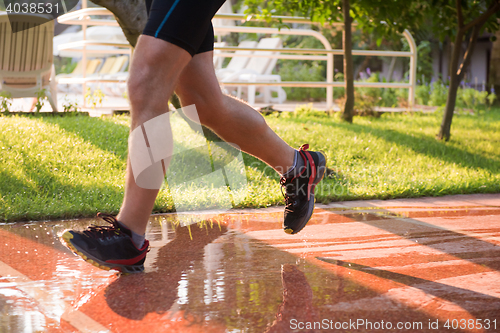 Image of sporty woman jogging