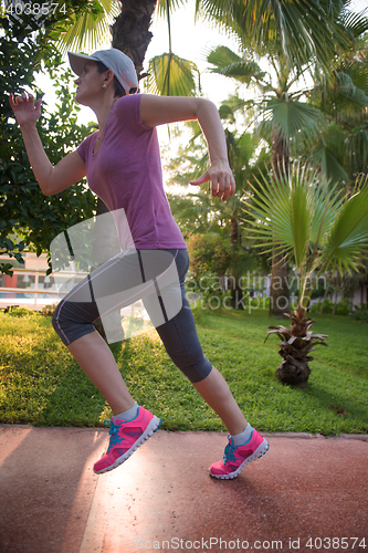 Image of sporty woman jogging