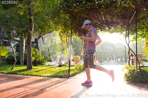 Image of sporty woman jogging