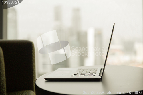 Image of close up of laptop computer on table at office
