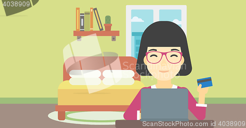 Image of Woman shopping online using her laptop.