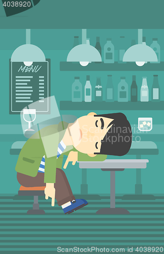 Image of Man sleeping in bar.