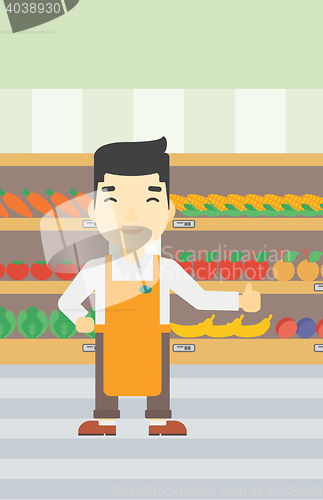 Image of Friendly supermarket worker vector illustration.