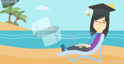 Image of Graduate lying in chaise lounge with laptop.