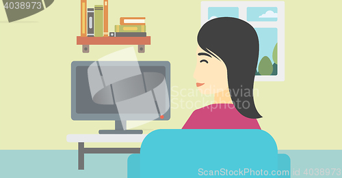 Image of Woman watching TV.