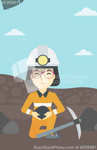 Image of Miner holding coal in hands vector illustration.