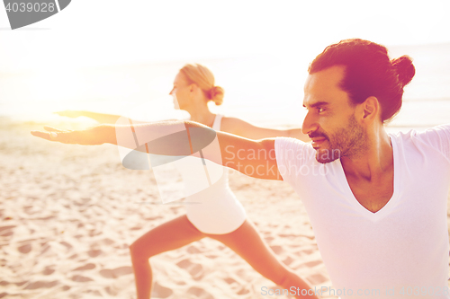 Image of close up of couple making yoga exercises outdoors