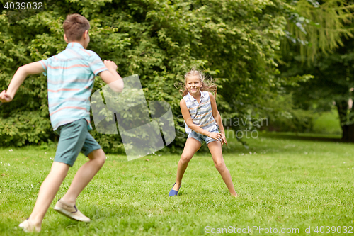 Image of happy kids running and playing game outdoors