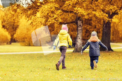 Image of group of happy little kids running outdoors