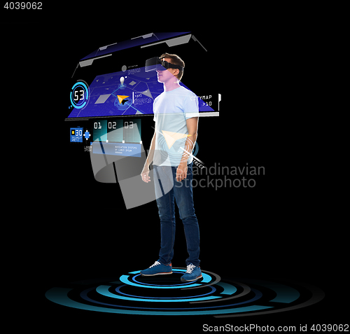 Image of happy man in virtual reality headset or 3d glasses