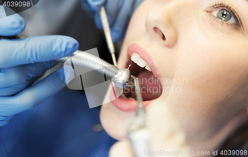 Image of close up of patient having teeth treatment