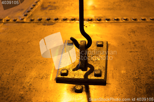 Image of close up of vintage metal hook and loop