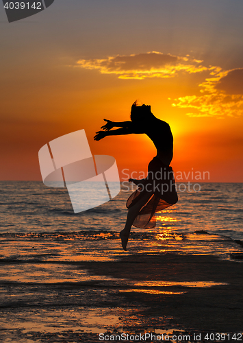 Image of girl at sunset