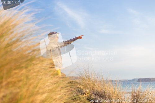 Image of Free active man enjoying beauty of nature.