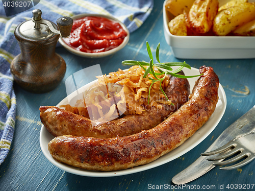 Image of grilled sausages with sauerkraut