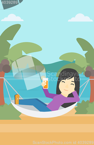 Image of Woman chilling in hammock.