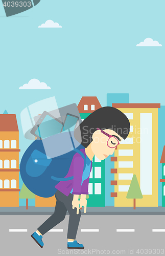Image of Woman with backpack full of electronic devices.