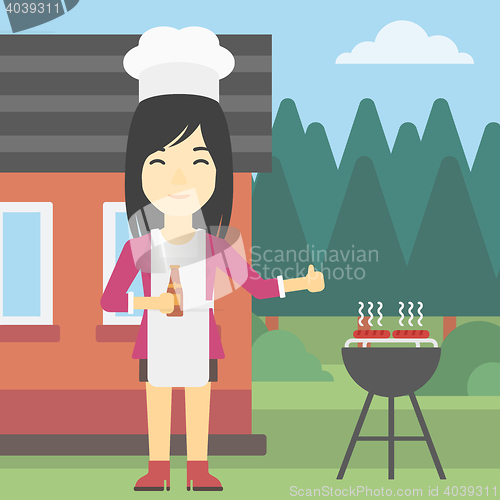 Image of Woman cooking meat on gas barbecue grill.