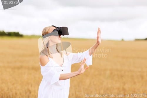 Image of woman in virtual reality headset on cereal field