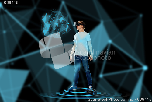 Image of happy man in virtual reality headset or 3d glasses