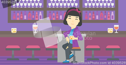 Image of Woman sitting at the bar counter.