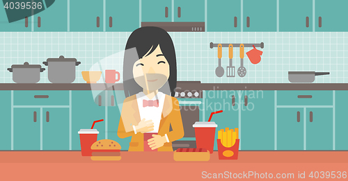 Image of Satisfied woman eating fast food.