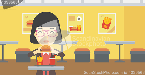 Image of Woman eating hamburger vector illustration.