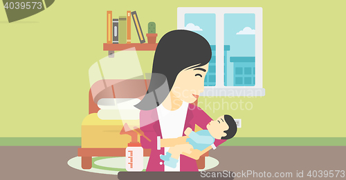 Image of Mother with baby and breast pump.