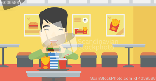 Image of Man eating hamburger vector illustration.