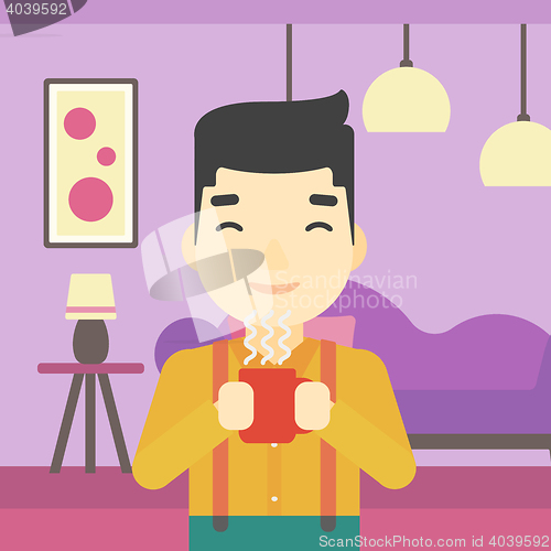 Image of Man enjoying cup of hot coffee.