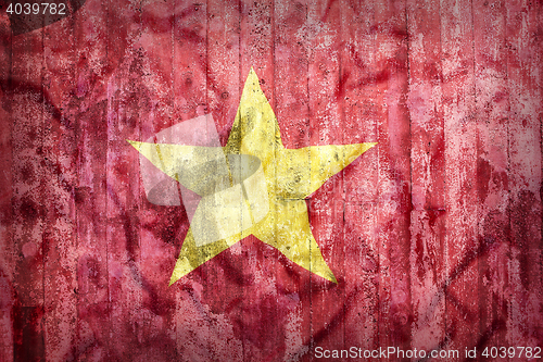 Image of Grunge style of Vietnam flag on a brick wall     