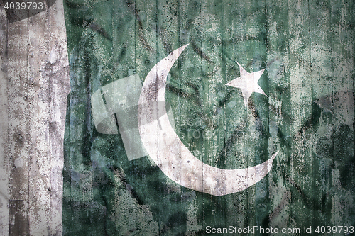 Image of Grunge style of Pakistan flag on a brick wall     