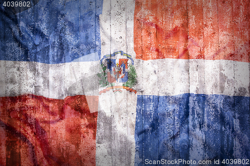 Image of Grunge style of Dominican Republic flag on a brick wall  