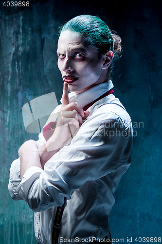 Image of Bloody Halloween theme: crazy joker face