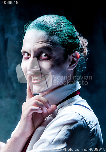 Image of Bloody Halloween theme: crazy joker face