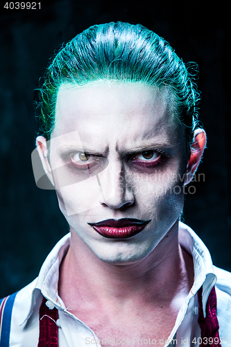 Image of Bloody Halloween theme: crazy joker face