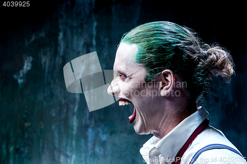 Image of Bloody Halloween theme: crazy joker face