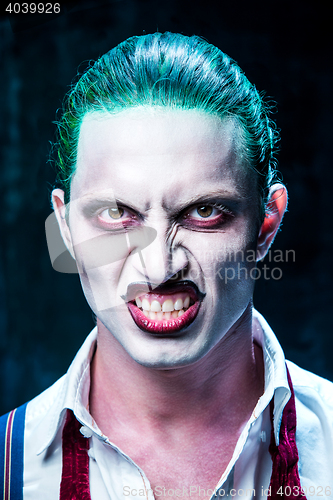 Image of Bloody Halloween theme: crazy joker face