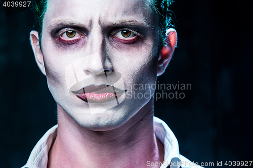 Image of Bloody Halloween theme: crazy joker face