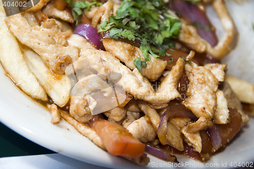 Image of pollo saltado