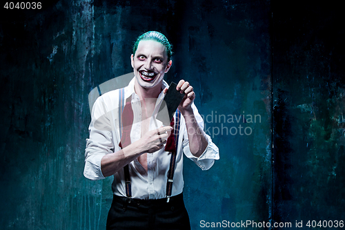 Image of Bloody Halloween theme: crazy joker face