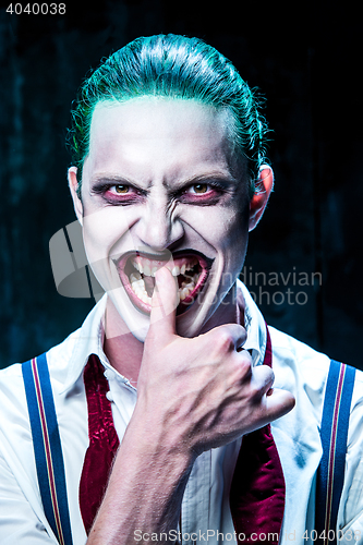 Image of Bloody Halloween theme: crazy joker face