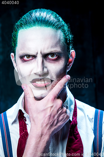 Image of Bloody Halloween theme: crazy joker face