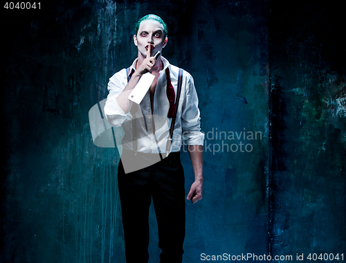 Image of Bloody Halloween theme: crazy joker face