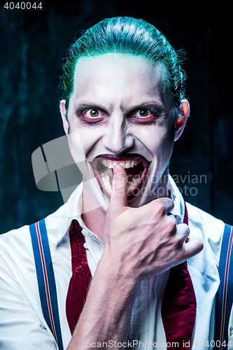 Image of Bloody Halloween theme: crazy joker face