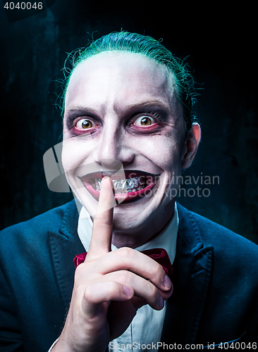 Image of Bloody Halloween theme: crazy joker face